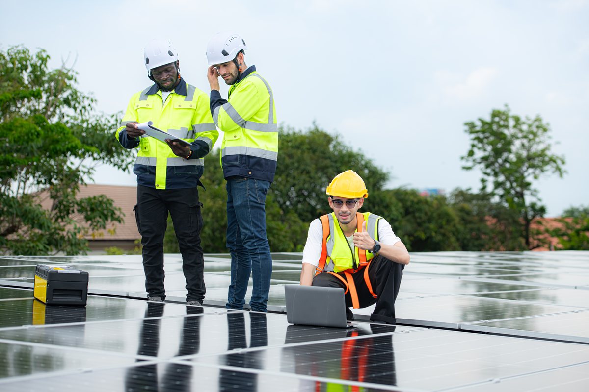 Group of engineer and technician inspects solar panel installation and test the operation of the panel